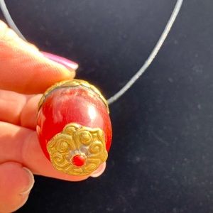Tibetan Nepalese Pendant. Strawberry quartz resin.